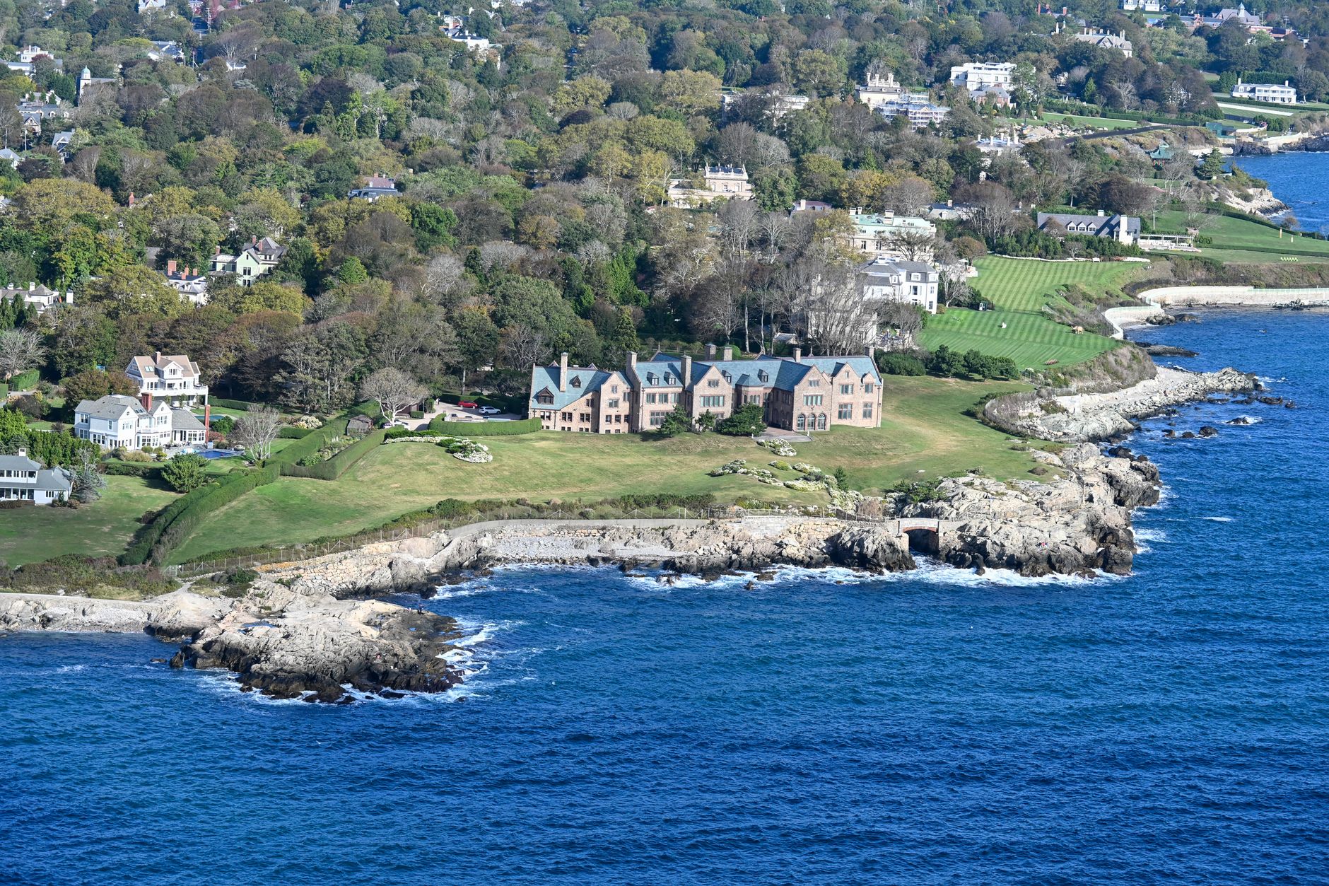 Luxury beach mansion with ocean view, spacious patio, and modern design available for sale